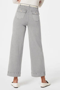 Gray wide-leg pants worn by a person on a white background