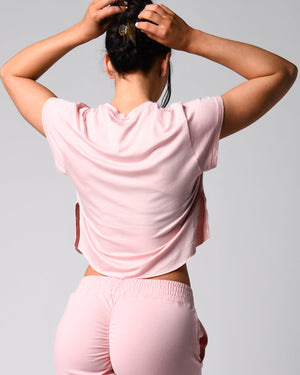 Back view of the pink *The Flutter Tee* (Perfect Pocket Tee)