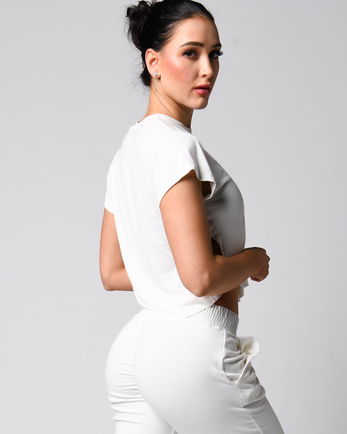 Right side view of the white *The Flutter Tee* (Perfect Pocket Tee)