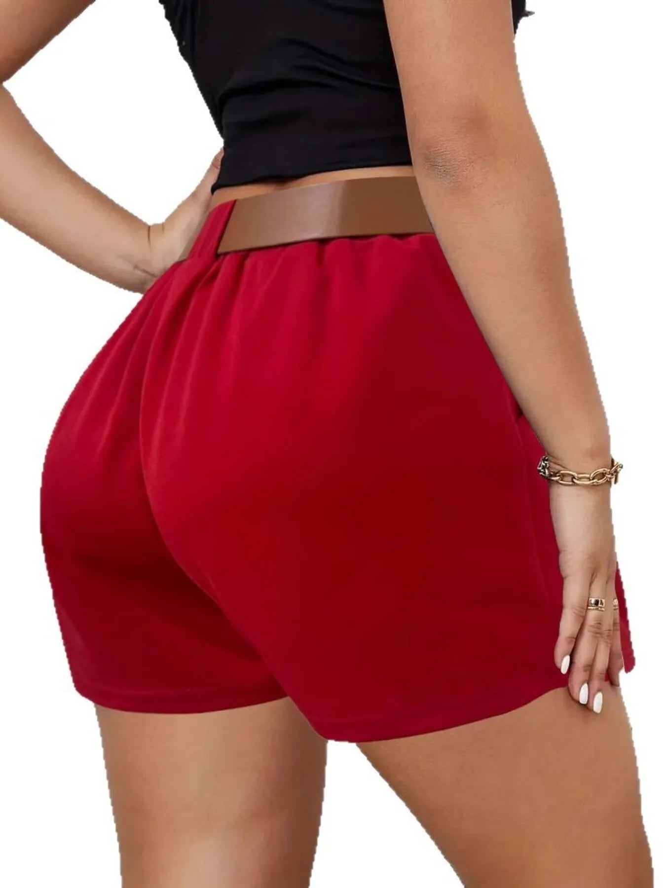 Red shorts worn by a person on a white background