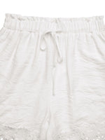 White textured pants with drawstring on a white background