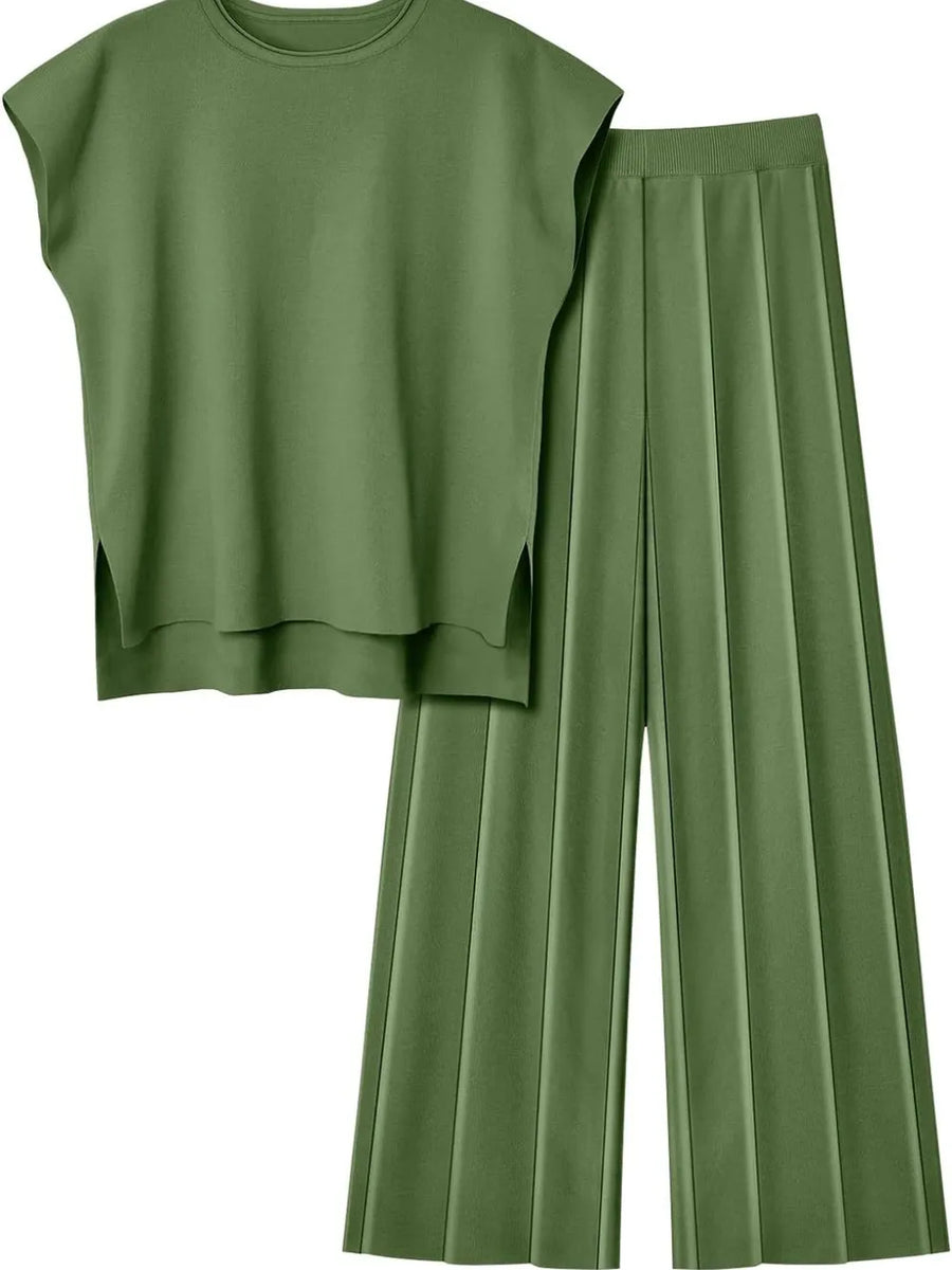 Green sleeveless top and wide-leg pants on a white background