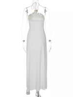 Backless Ruched Halter Neck Maxi Dress on a mannequin 