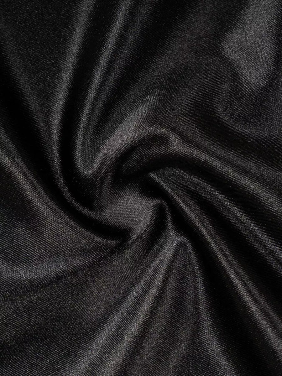 Close-up of dark gray fabric with folds