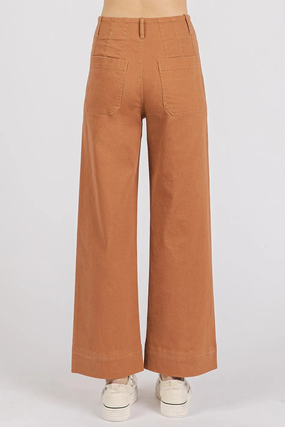 Brown wide-leg pants on a white background