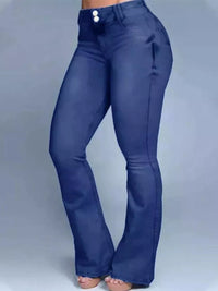 Blue bell-bottom pants on a gray background