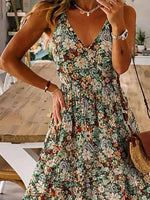 Woman wearing a floral dress in an indoor setting