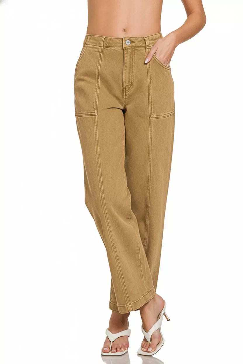 Tan pants worn by a person on a white background