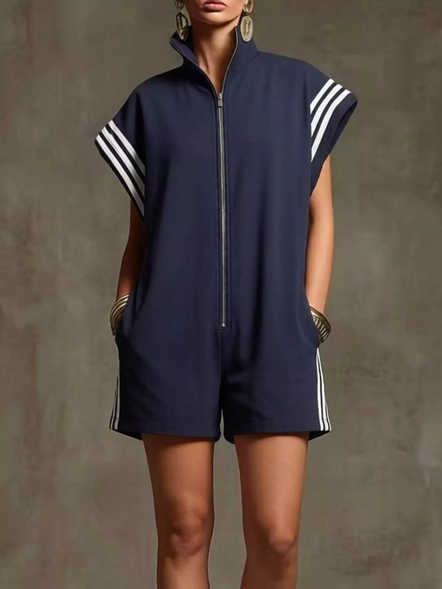 Navy blue sleeveless romper with white stripes on a plain background