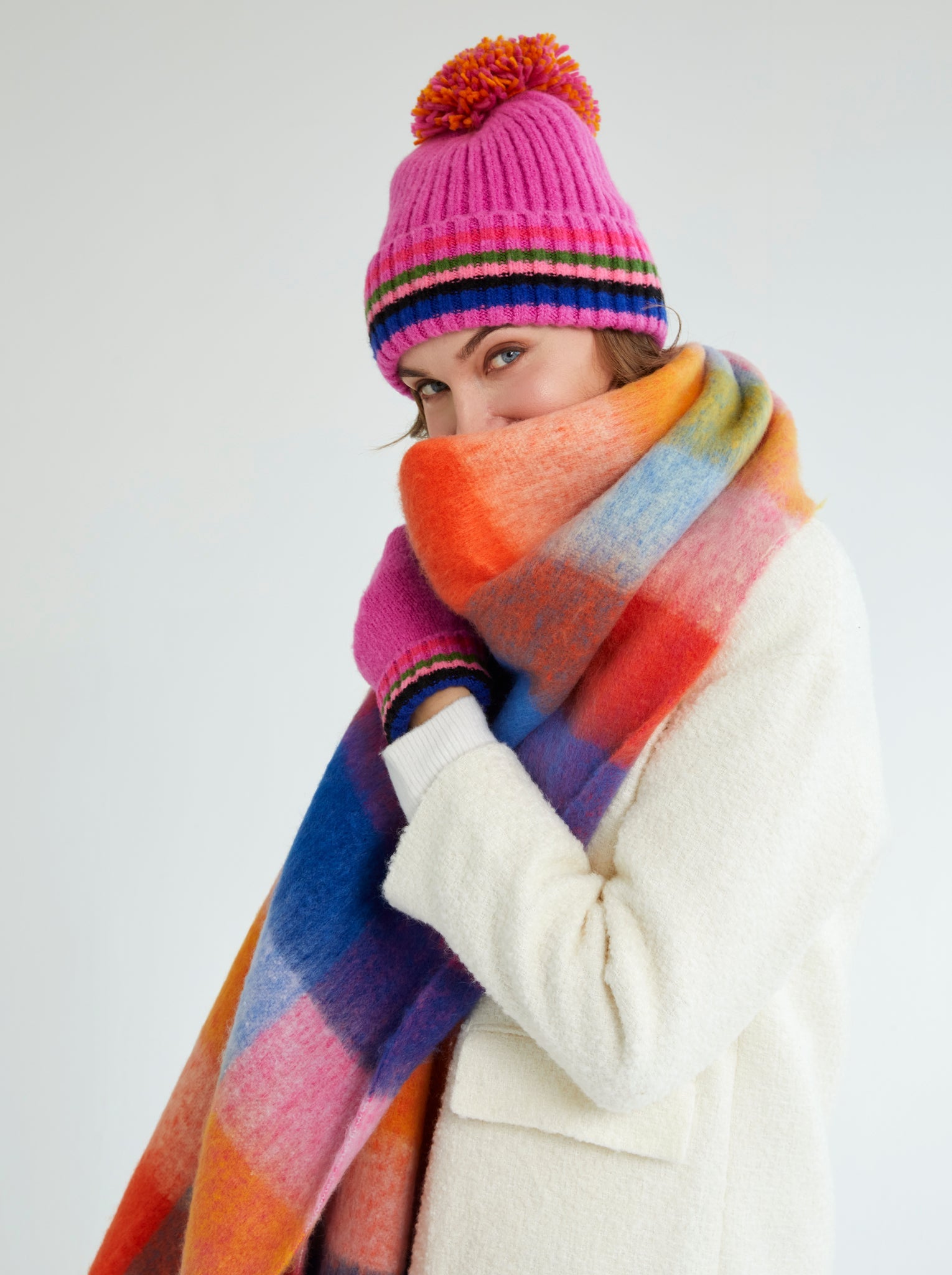 Woman in matching scarf and Shiraleah Ronen Hat, Magenta