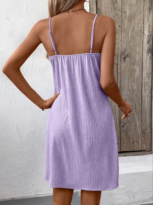Back view of purple Ivy Lane Textured V-Neck Sleeveless Mini Cami Dress