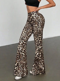 Leopard print flared pants worn by a person on a plain background