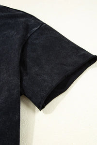 Close-up of a dark blue fabric on a light beige background