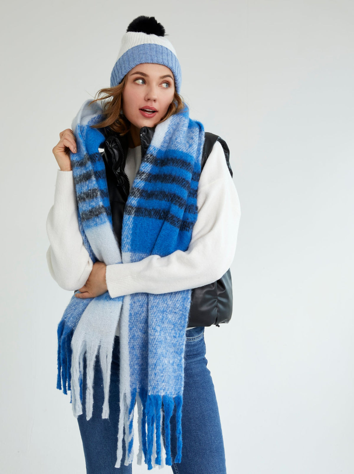 Woman in close up view of scarf and matching Shiraleah Jane Hat, Ivory 