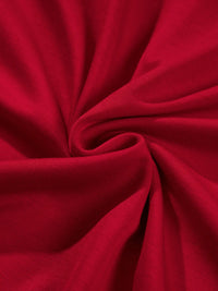 Close-up of red fabric with folds