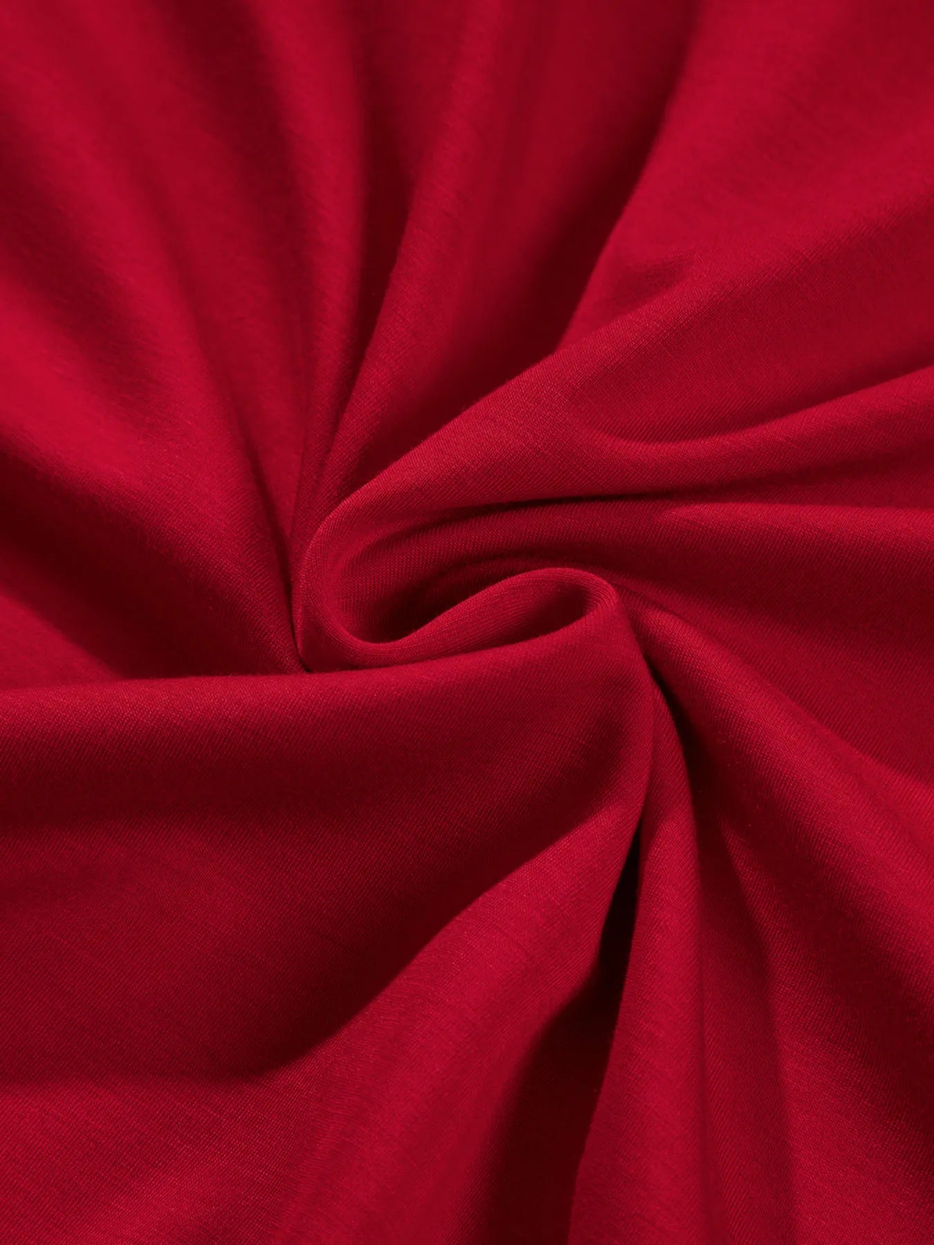 Close-up of red fabric with folds