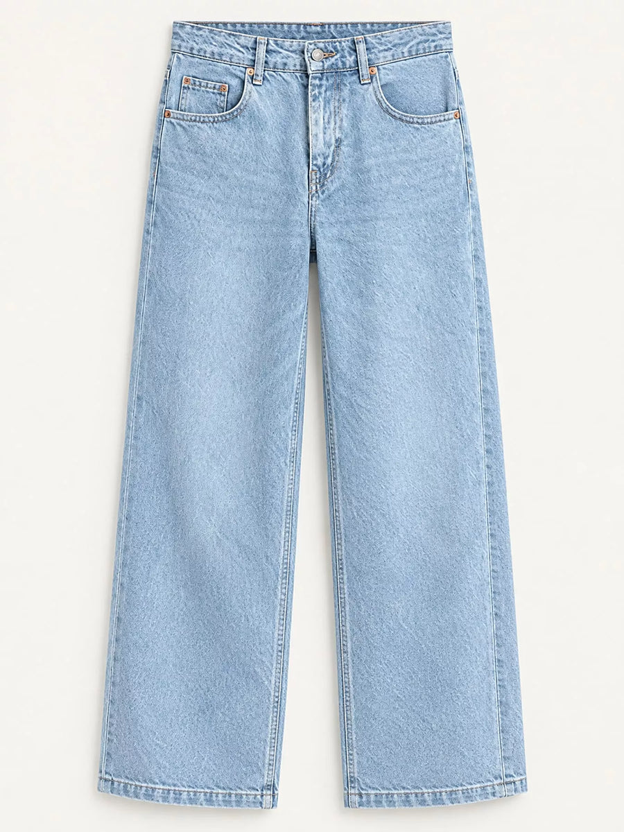 Light wash blue denim jeans with a straight-leg fit, shown flat against a light beige background.