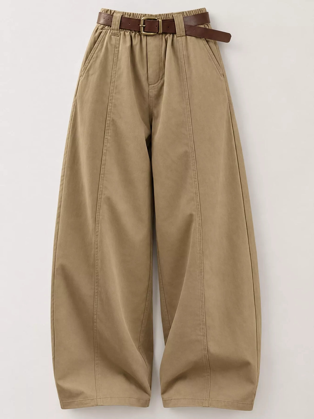 A pair of wide-leg, pleated khaki pants with a brown leather belt, displayed flat against a light gray background.