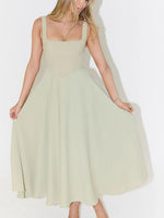 Model showing beige Max-Origin dress