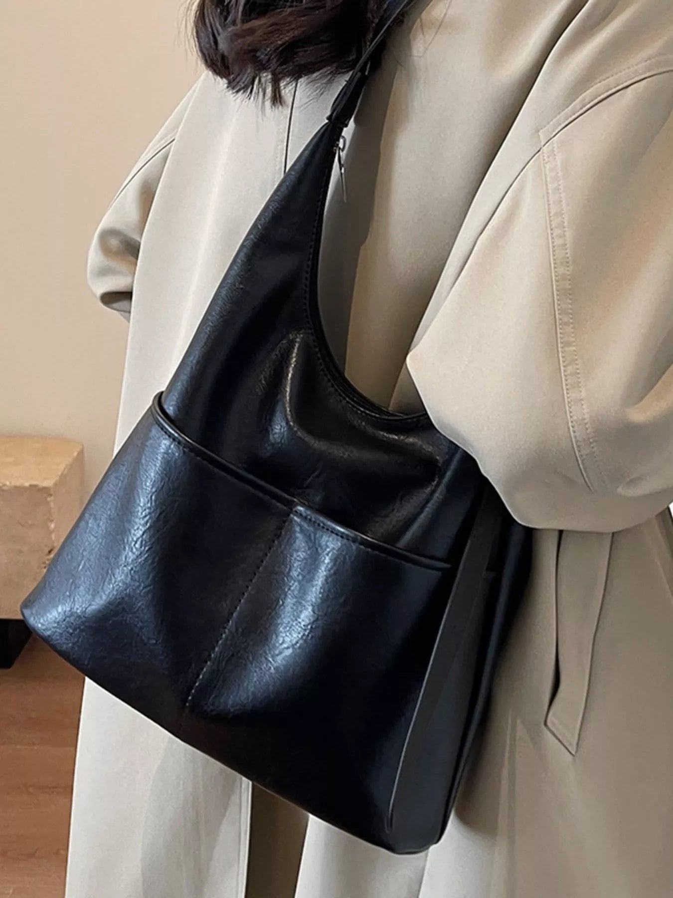 Woman carrying the black Adjustable Strap Shoulder Bag For Women