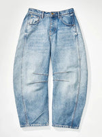 Light blue jeans on a white background