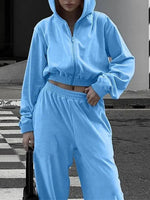 Front view of blue Zip Up Hoodie and Pocketed Pants Set