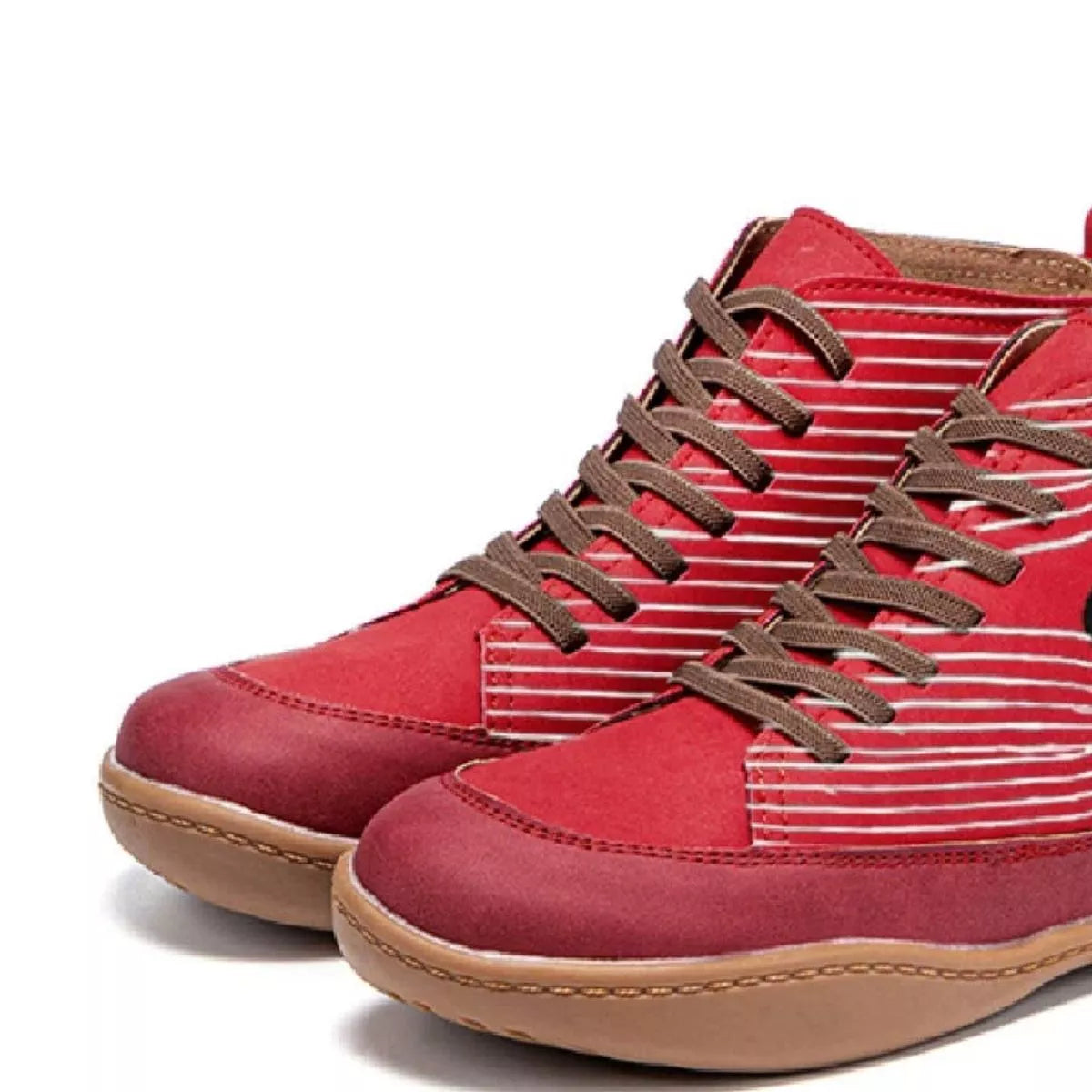 Red high-top sneakers with brown laces on a white background