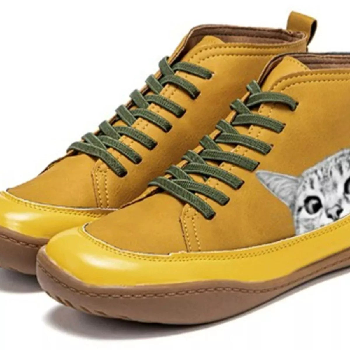 Yellow high-top sneakers with green laces and a cat face design on a white background