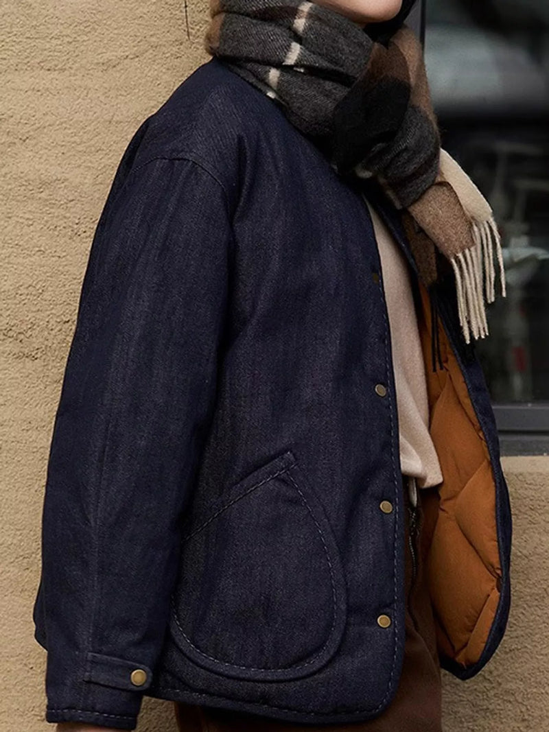 Lady with scarf around her neck wearing a blue Diamond-Quilted Lightweight Cropped Reversible Down Jacket