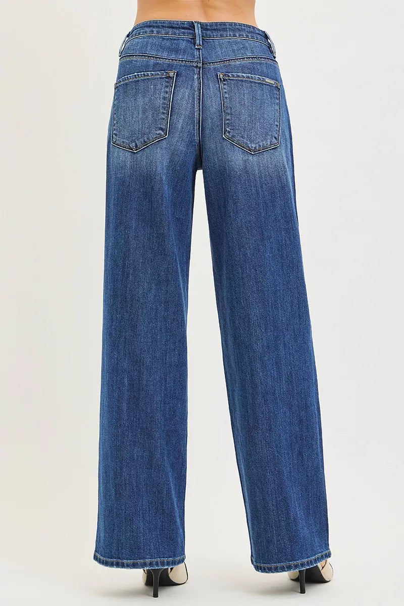 Blue jeans shown from the back on a white background