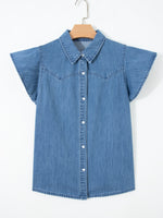 Blue denim shirt on a hanger against a white background