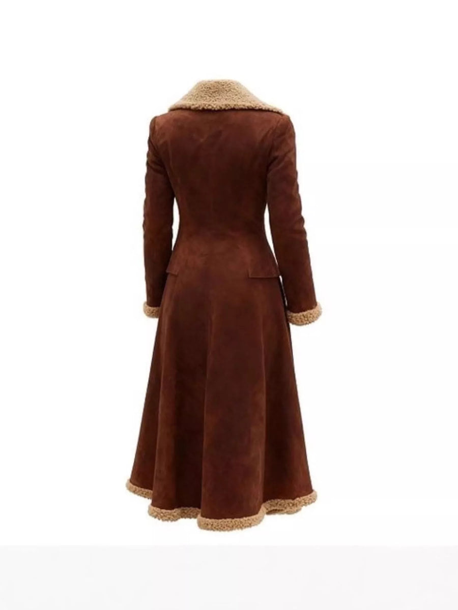 Brown coat with fur trim on a white background