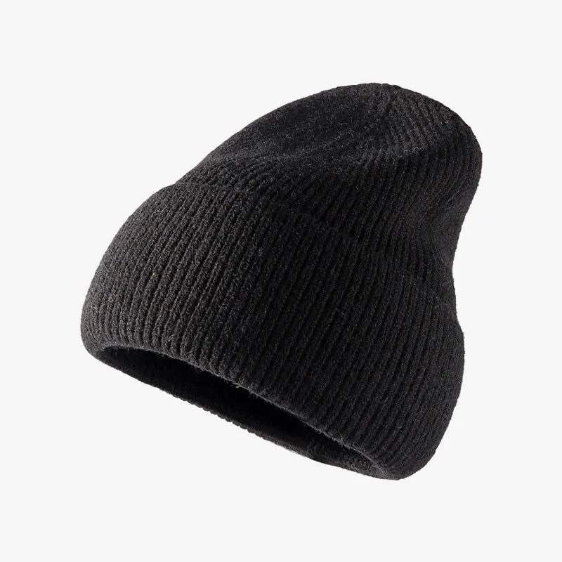 Black knit beanie on a white background