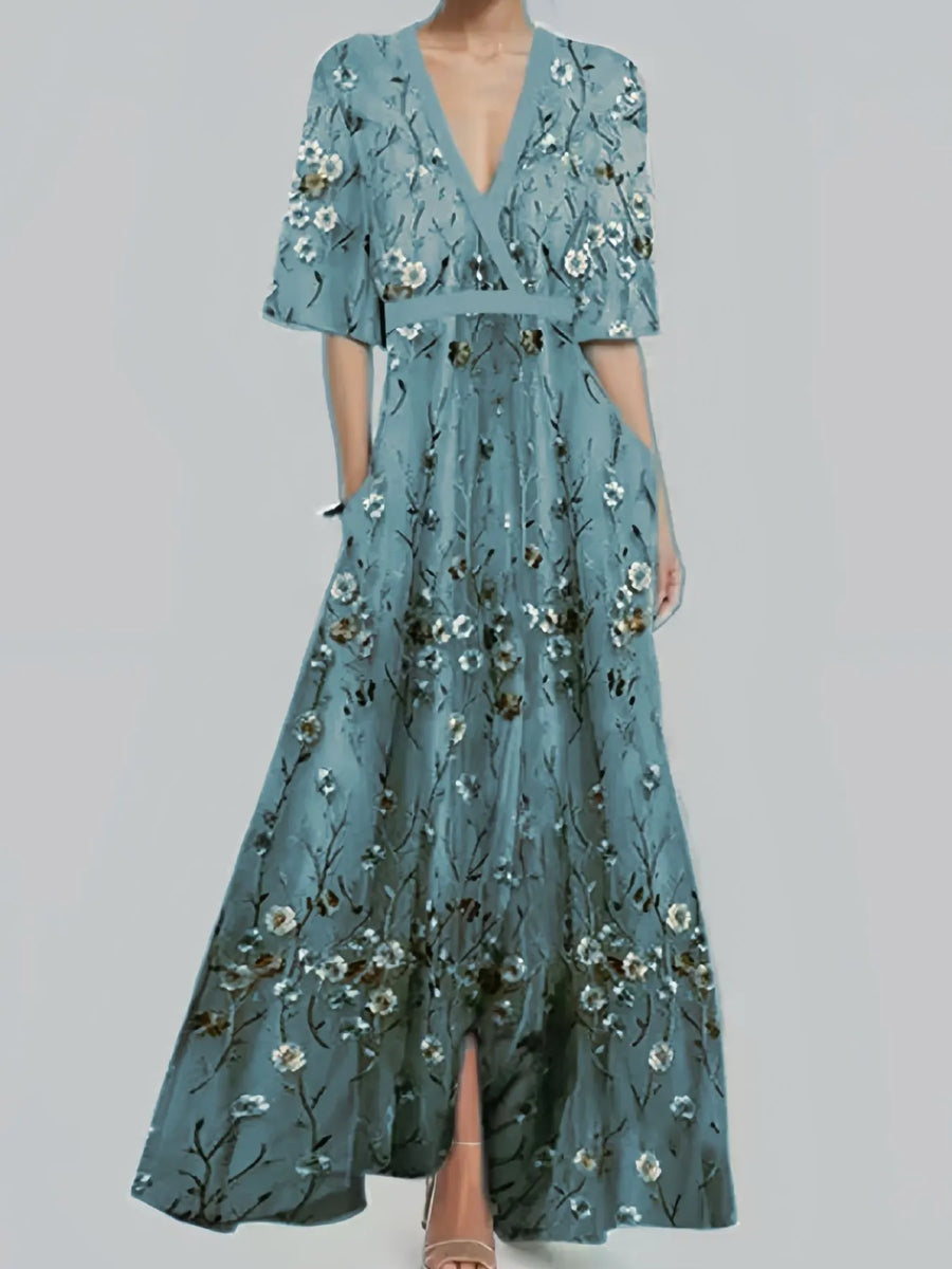 Blue floral dress on a gray background