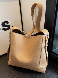 A close up of Women's Leather Adjustable Strap Crossbody Bag