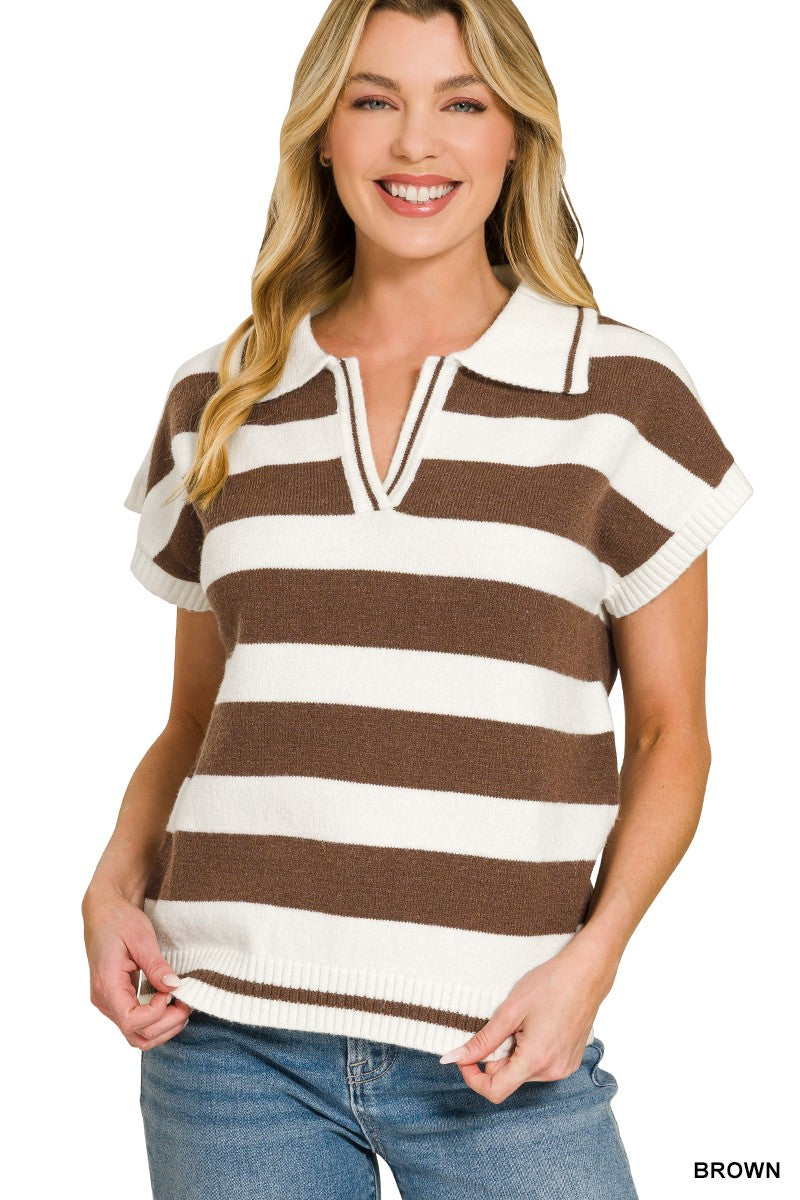 Woman wearing a brown and white striped short-sleeve sweater on a white background