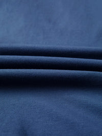 Close-up of blue fabric with folds