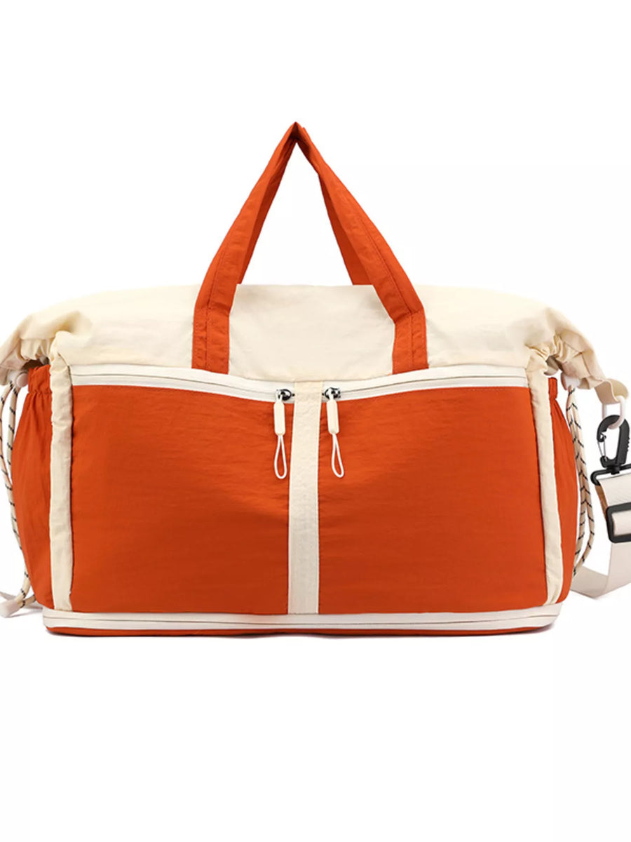 Orange and white duffel bag on a white background