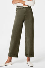 Person wearing olive green pants on a white background