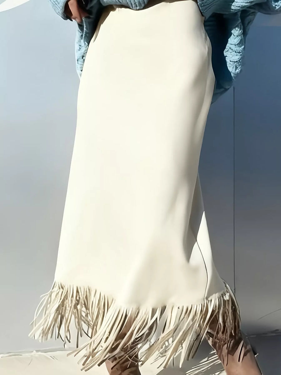 A picture of a white High-Waisted Fringe Midi Skirt on a blue backgroung