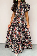 Woman wearing a floral dress with a plain background