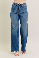 Blue jeans on a beige background