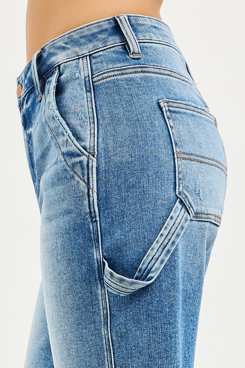 Close-up of blue jeans on a white background