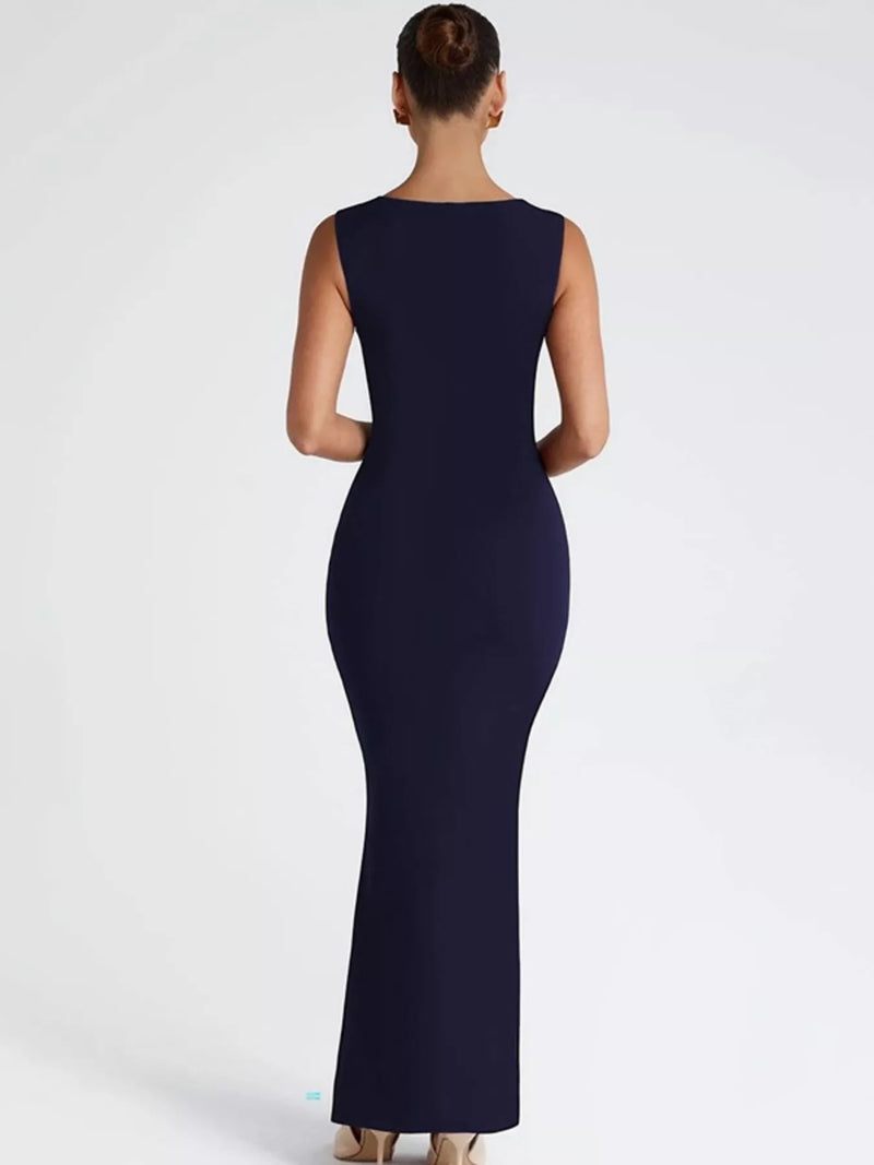 Navy blue sleeveless dress on a white background
