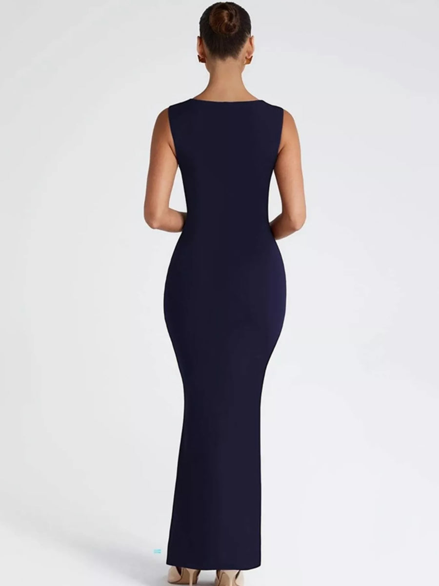 Navy blue sleeveless dress on a white background