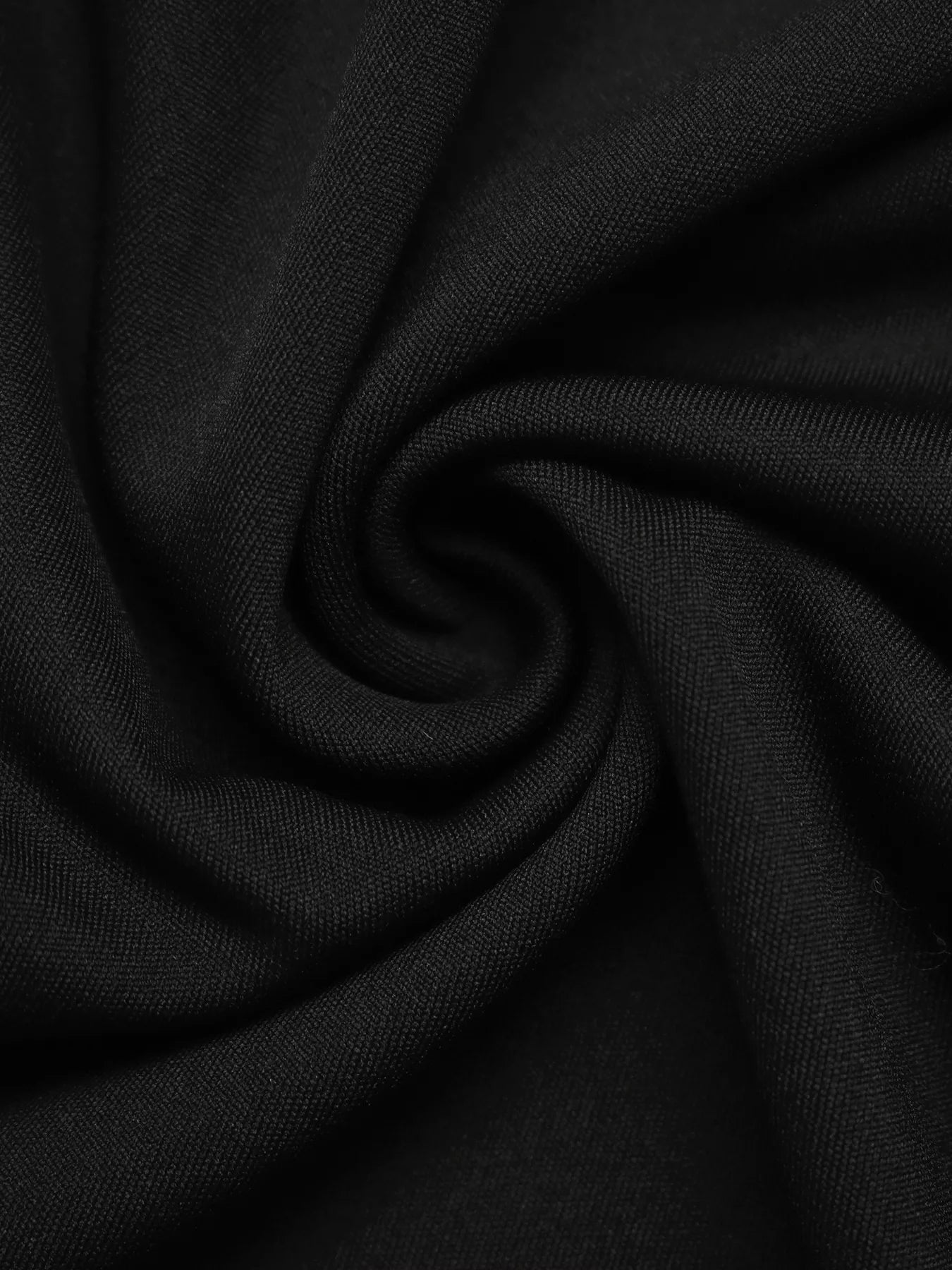 Close-up of black fabric with folds