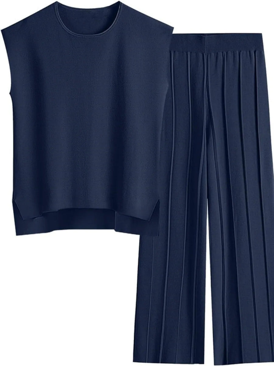Navy blue sleeveless top and wide-leg pants set on a white background