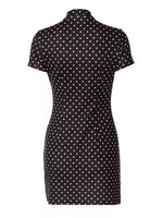 Black dress with white polka dot pattern on a white background