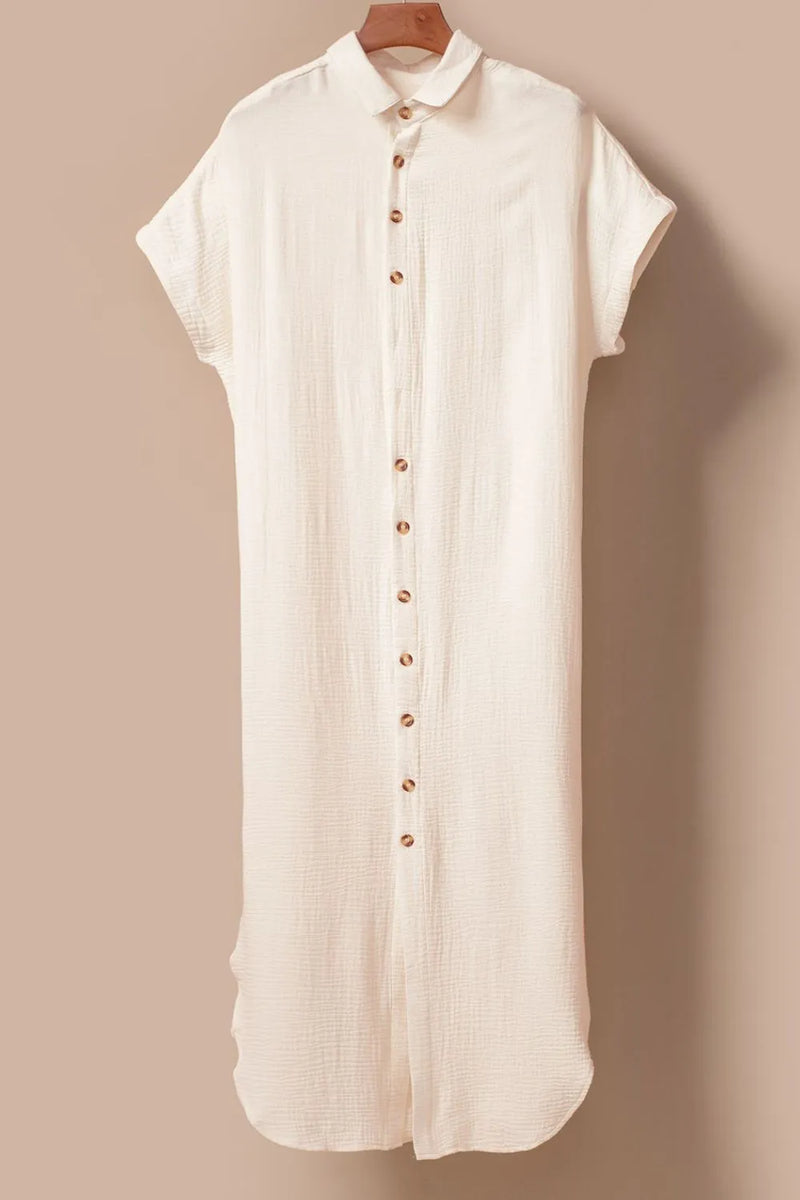 Beige dress with buttons on a beige background