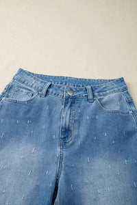 Blue jeans with a beige background